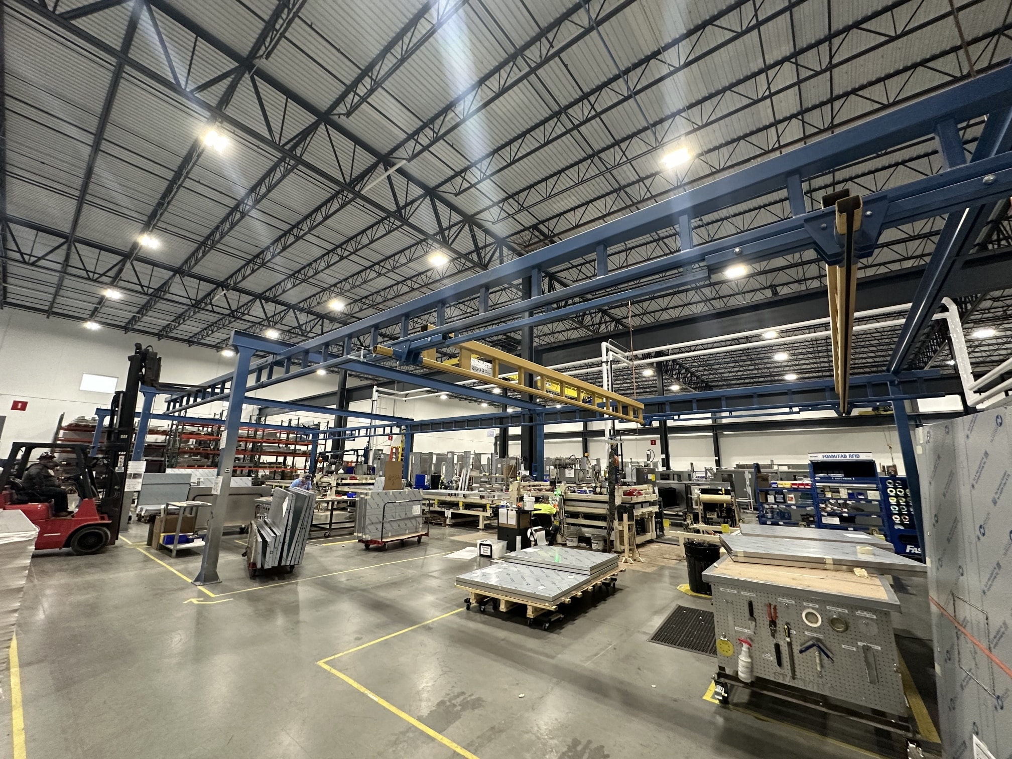 Gorbel Crane System Approx. Dimension 30’x90’x10’H w/ Two 30′ Gantries. Includes 2 ton & 1.25 ton Hoist / Power Lift – Manual Movement.