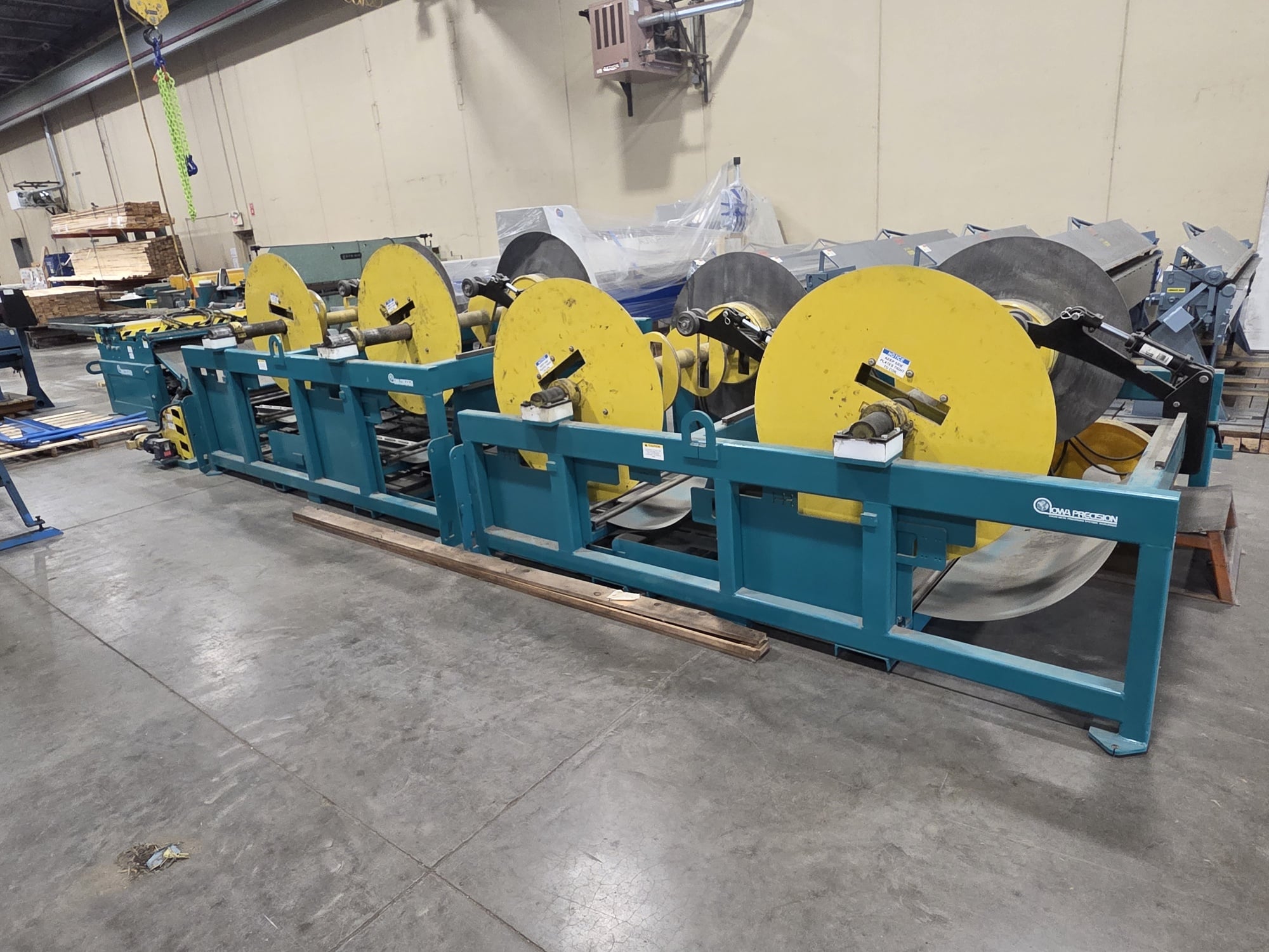 Used Iowa Precision Model PLCF6016 s/n PLCF220412006 w/ 4 drop-in uncoilers Model GFD4S6012KLPHM s/n UC220412003 4 station auto select model CS4S-60